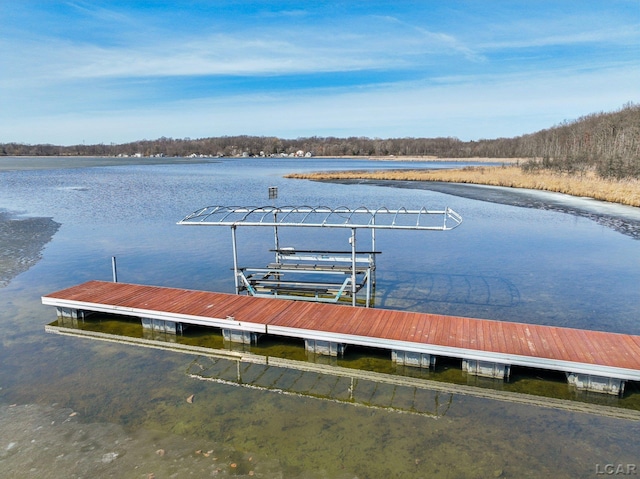 view of dock with a water view