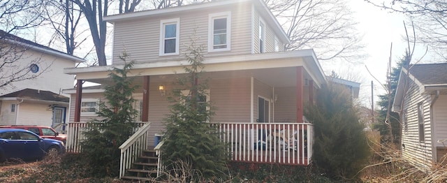 view of home's exterior with a porch