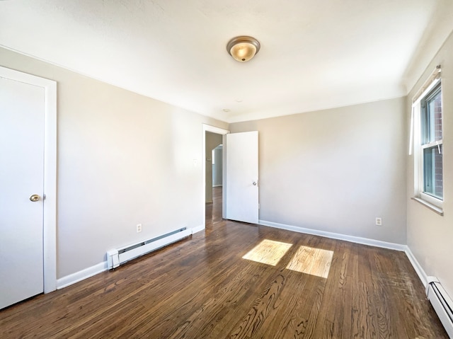 20895 Sunset Ave, Warren, MI 48091 - empty room with a baseboard radiator, baseboards, and dark wood-style floors
