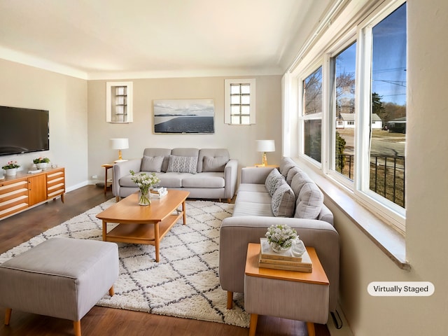 20895 Sunset Ave, Warren, MI 48091 - living area featuring wood finished floors and baseboards