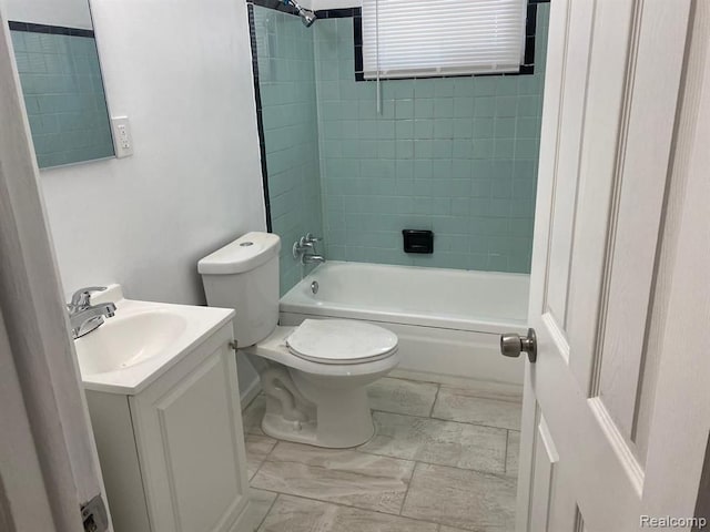 full bathroom featuring vanity, shower / bath combination, and toilet