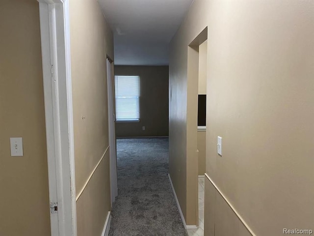 hall featuring carpet