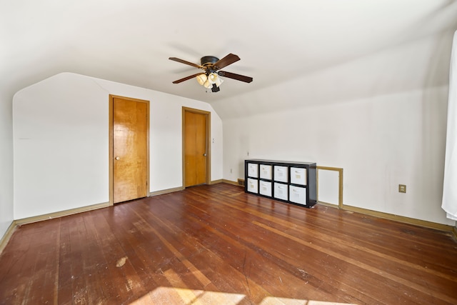 bonus room featuring baseboards, hardwood / wood-style flooring, ceiling fan, and vaulted ceiling