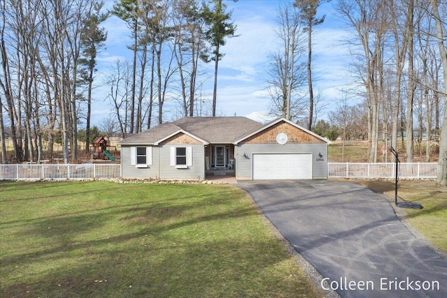 view of front of home with a playground, an attached garage, fence, and driveway