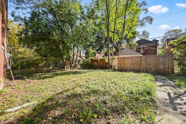 view of yard with fence