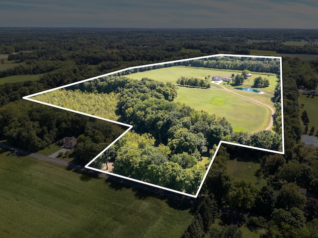 2122 Grange Rd, Buchanan, MI 49107 - aerial view of property and surrounding area with a heavily wooded area and property boundaries highlighted