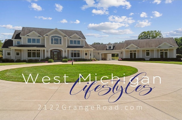 2122 Grange Rd, Buchanan, MI 49107 - view of front of property featuring curved driveway, a front yard, and french doors