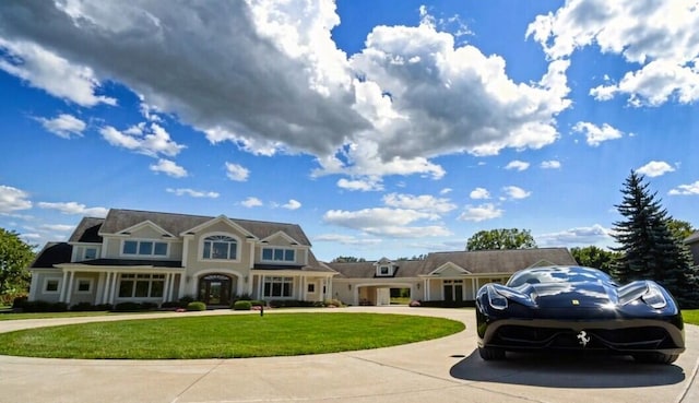 2122 Grange Rd, Buchanan, MI 49107 - view of front of property with curved driveway and a front yard
