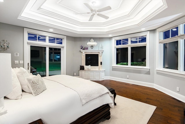 2122 Grange Rd, Buchanan, MI 49107 - bedroom featuring access to exterior, dark wood-type flooring, recessed lighting, baseboards, and crown molding