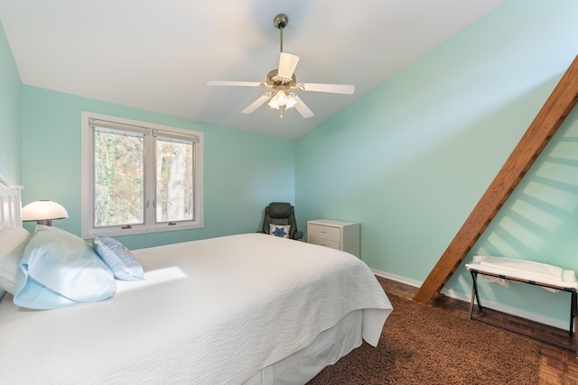 bedroom featuring a ceiling fan and baseboards