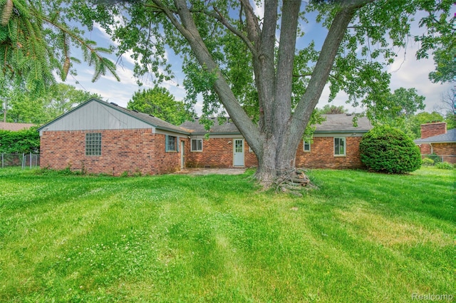 2810 Otsego Rd, Waterford, MI 48328 - back of house with brick siding