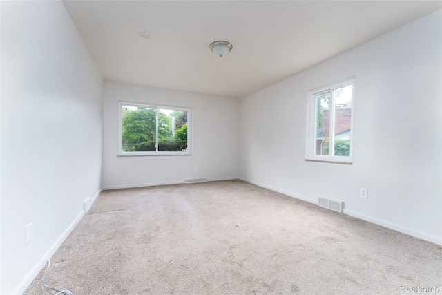 2810 Otsego Rd, Waterford, MI 48328 - carpeted spare room with healthy amount of natural light