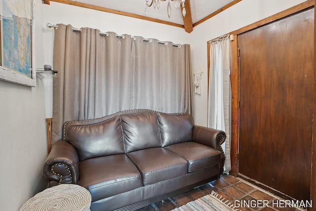 living area featuring a textured ceiling