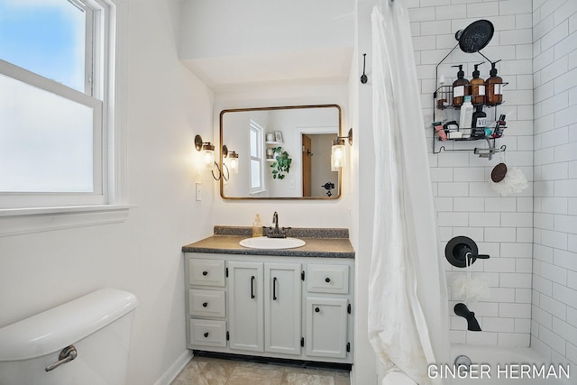 bathroom with shower / bath combination with curtain, a healthy amount of sunlight, toilet, and vanity