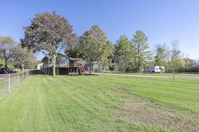 view of yard featuring stairs and a fenced backyard