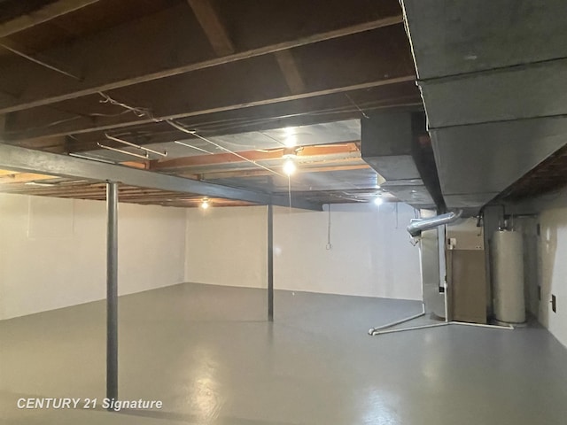 unfinished basement with gas water heater