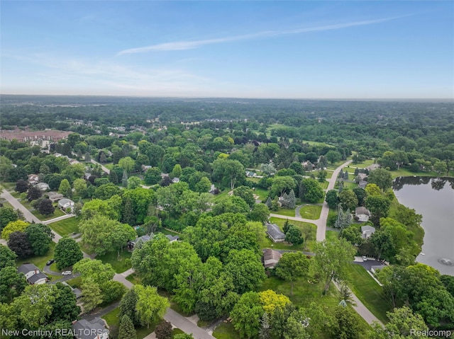 6750 Limerick Ln, Troy, MI 48098 - drone / aerial view of a nearby body of water and a heavily wooded area