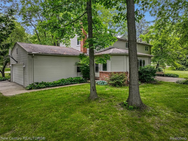 6750 Limerick Ln, Troy, MI 48098 - view of front facade featuring a garage and a front lawn