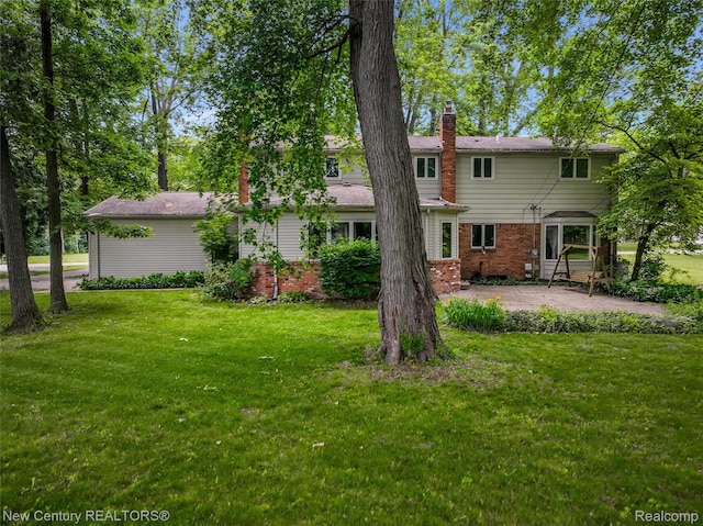 6750 Limerick Ln, Troy, MI 48098 - back of house with a patio area, a chimney, a yard, and brick siding