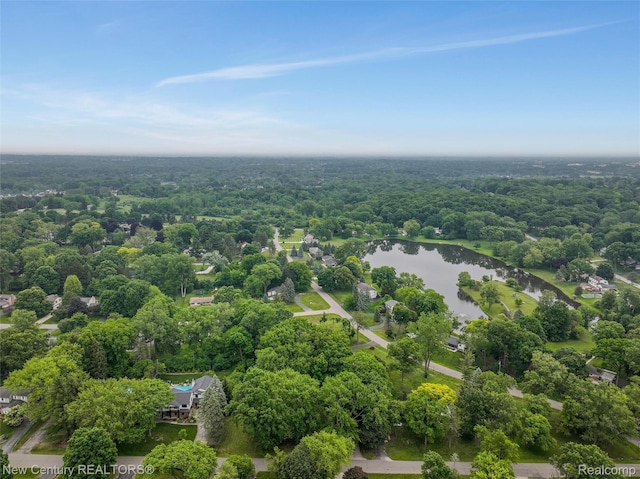 6750 Limerick Ln, Troy, MI 48098 - drone / aerial view of a large body of water and a heavily wooded area