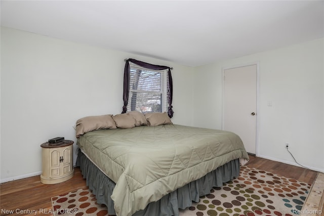 6750 Limerick Ln, Troy, MI 48098 - bedroom featuring wood finished floors and baseboards
