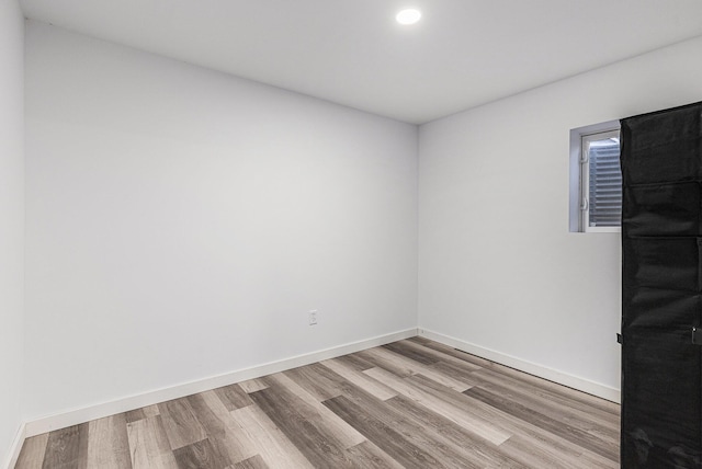 5557 Front St, Newaygo, MI 49337 - empty room featuring baseboards and wood finished floors