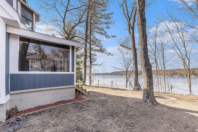 5557 Front St, Newaygo, MI 49337 - view of yard featuring a water view