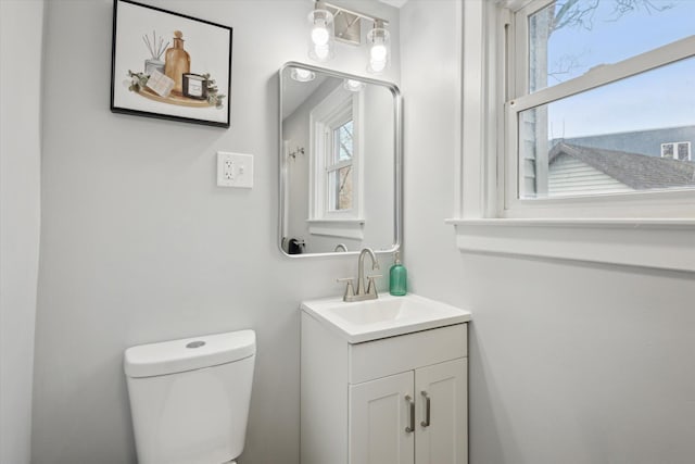 half bath with toilet and vanity