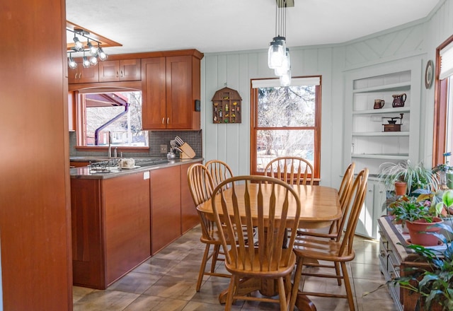 dining space featuring built in features