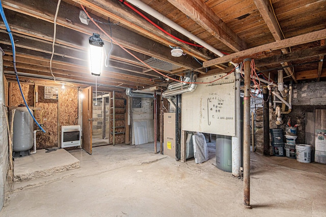 unfinished basement featuring heating unit