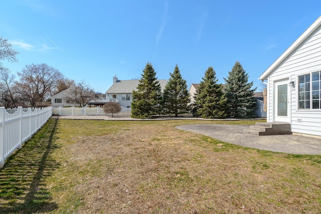 view of yard with a patio and a fenced backyard