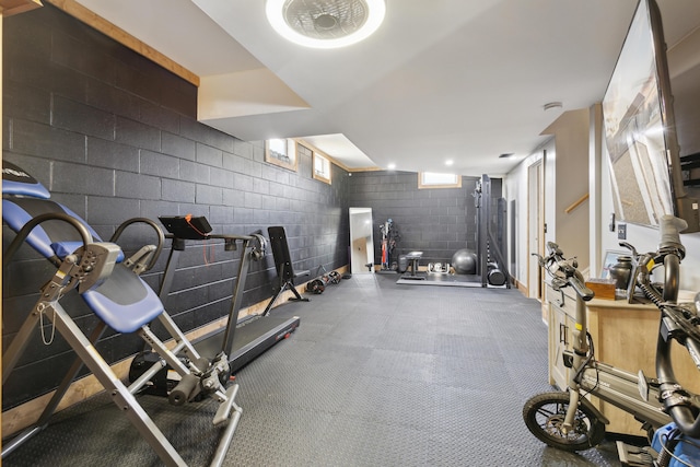 gym with concrete block wall