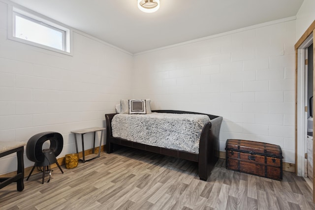 bedroom with light wood-style floors