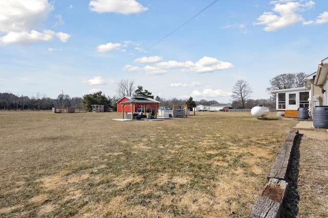 view of yard with a sunroom