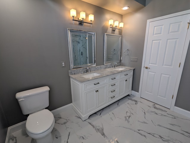 full bath featuring toilet, baseboards, marble finish floor, and a sink