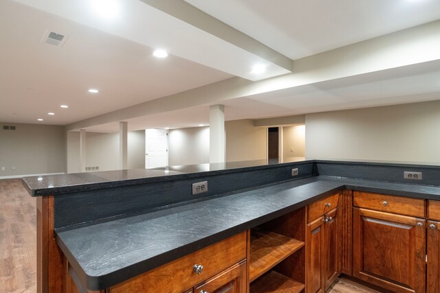 bar with recessed lighting, visible vents, light wood-style floors, and a dry bar