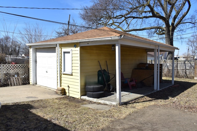 view of outdoor structure with an outdoor structure and fence