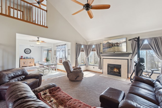 511 State St, Oxford, MI 48371 - living area with ceiling fan, high vaulted ceiling, carpet, and a tile fireplace