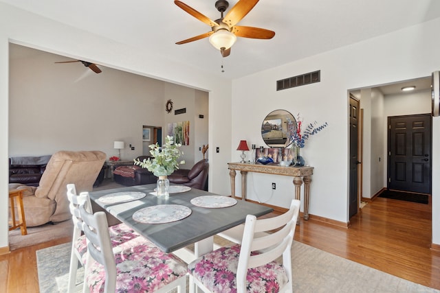 511 State St, Oxford, MI 48371 - dining space featuring a ceiling fan, light wood-style floors, and baseboards
