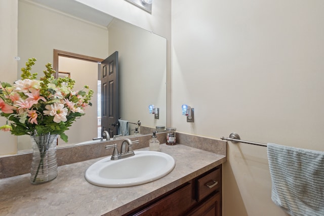 511 State St, Oxford, MI 48371 - bathroom with vanity and crown molding