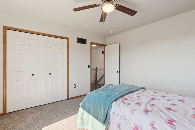 511 State St, Oxford, MI 48371 - bedroom with carpet flooring, a closet, baseboards, and a ceiling fan