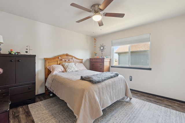 511 State St, Oxford, MI 48371 - bedroom with dark wood-style flooring, baseboards, and ceiling fan