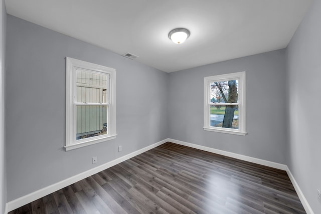 20450 Midway Ave, Southfield, MI 48075 - unfurnished room with dark wood-style flooring and baseboards