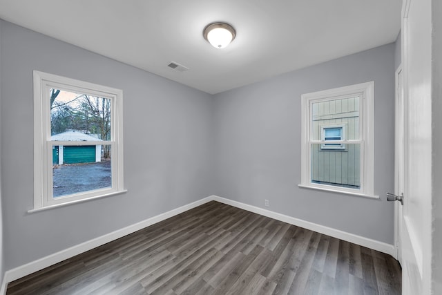 20450 Midway Ave, Southfield, MI 48075 - spare room featuring dark wood-style floors and baseboards