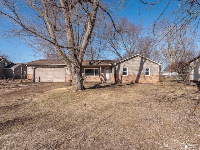 single story home with fence and brick siding