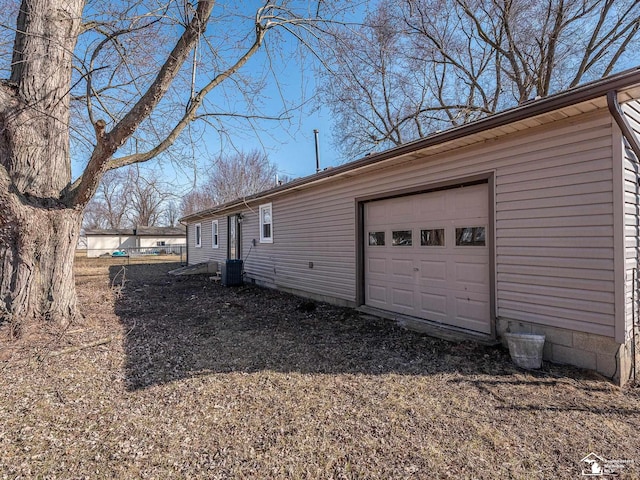 exterior space featuring central AC unit