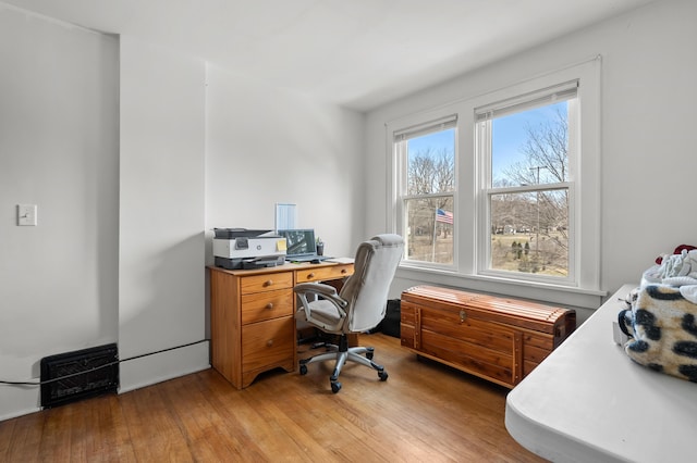 office space featuring light wood-style floors