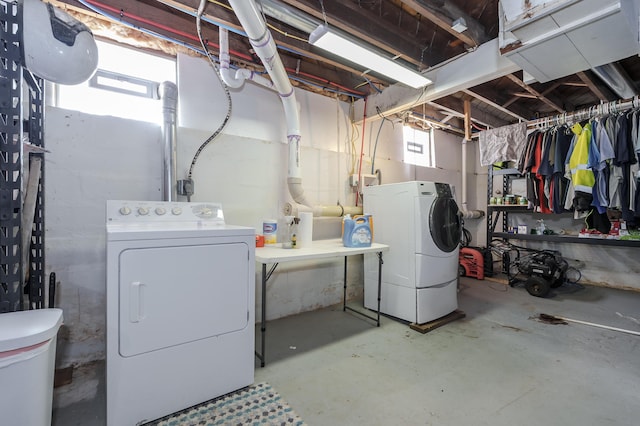 below grade area featuring separate washer and dryer