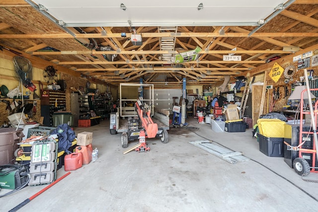 garage with a workshop area