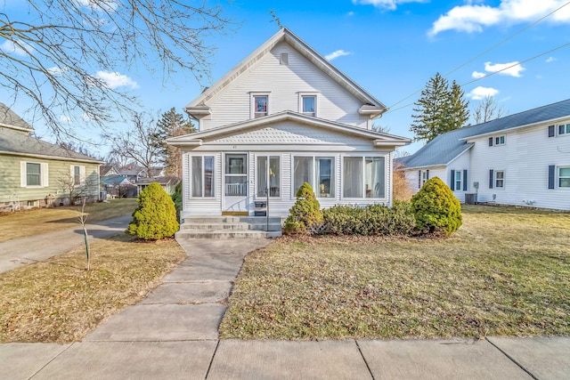 view of front of home with a front lawn